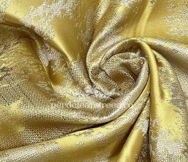 Draperie din stofa cu texturata cu pete. Predomina culoarea galben