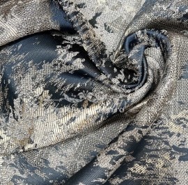 Draperie din stofa cu texturata cu pete.Predomina culoarea albastru-bleumarin